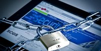 Tablet hinter versperrtem Kettengreuz